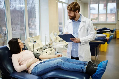 Person donating blood at a local blood drive