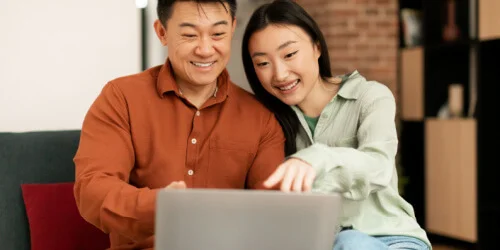 A plant growing out of an egg that's full of money 