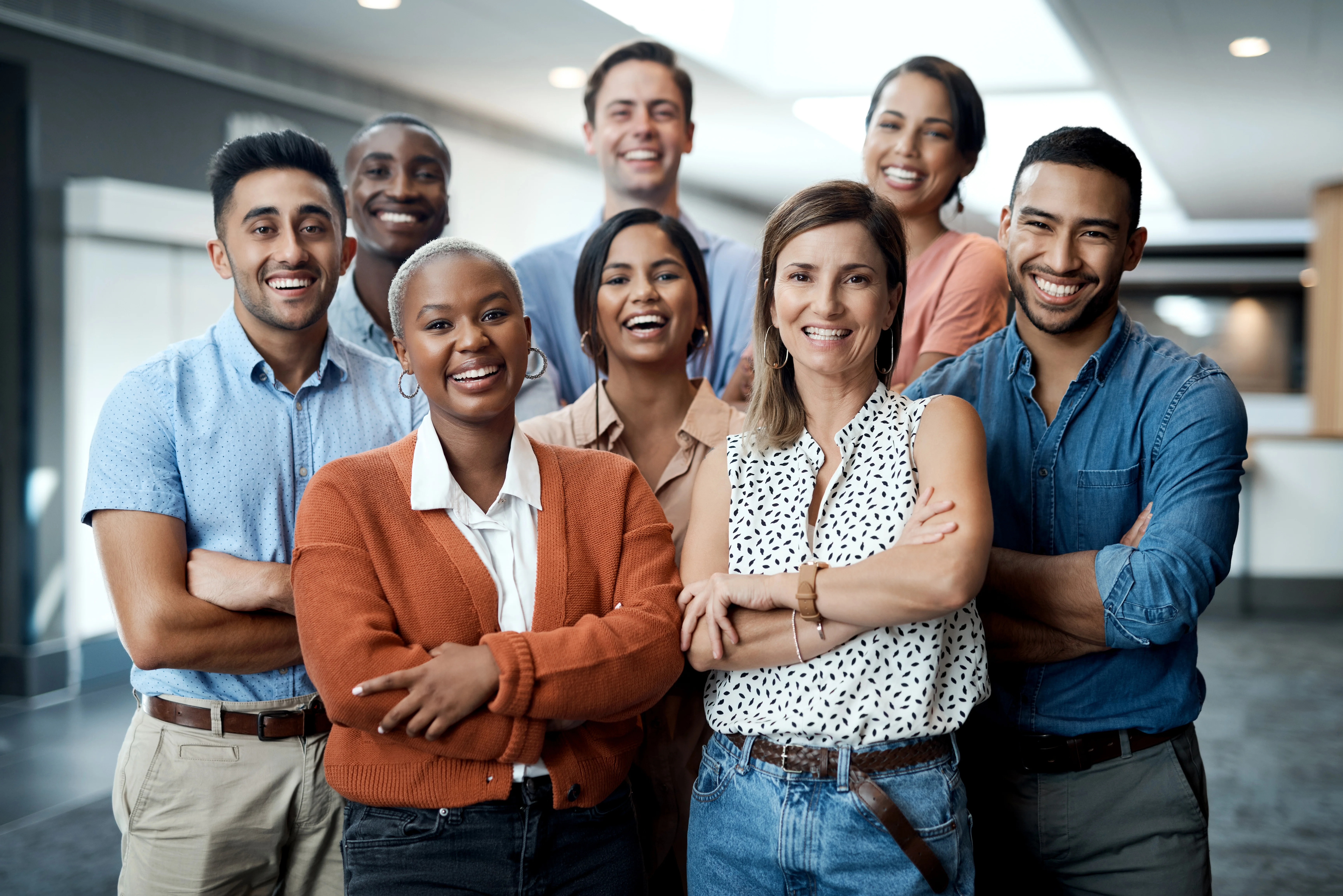 diverse employees smiling together