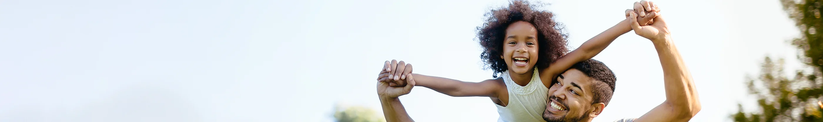 Man with child on shoulders