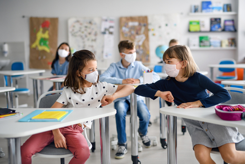 kids wearing masks in classroom