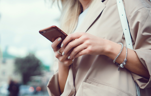 woman looking at phone