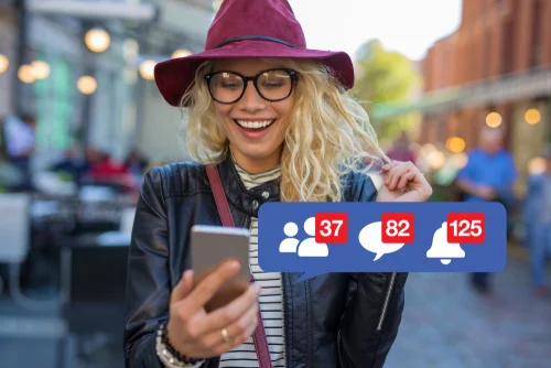 woman looking at phone facebook